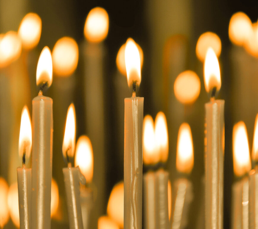 Burning candles during worship.